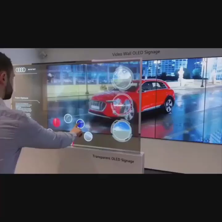 Transparentny ekran dotykowy wykorzystywany do prezentacji treści